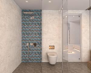 a bathroom with a toilet and a glass shower at RENEX HOTELS in Antalya
