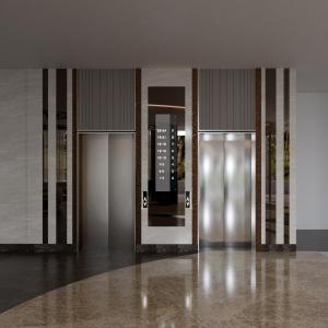 a lobby with three elevators with their doors open at RENEX HOTELS in Antalya