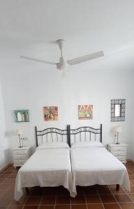Ένα ή περισσότερα κρεβάτια σε δωμάτιο στο Atico Duplex con magnificas vistas