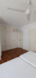 Ένα ή περισσότερα κρεβάτια σε δωμάτιο στο Atico Duplex con magnificas vistas