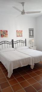 Ένα ή περισσότερα κρεβάτια σε δωμάτιο στο Atico Duplex con magnificas vistas