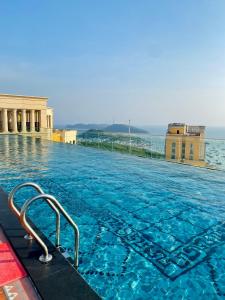 a large swimming pool on top of a building at La Phan Phu Quoc, Hillside Apartment in Phu Quoc