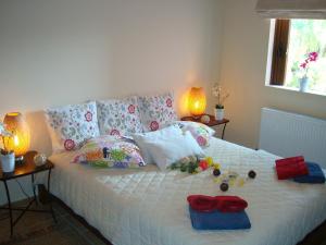 Ένα ή περισσότερα κρεβάτια σε δωμάτιο στο Villa Hermes Trismegistos