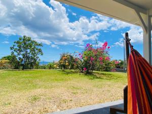 Zahrada ubytování Villa Créole vue sur mer des Caraïbes et montagne Pelée