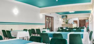 Restoran või mõni muu söögikoht majutusasutuses Pensiune Domeniul Stanca