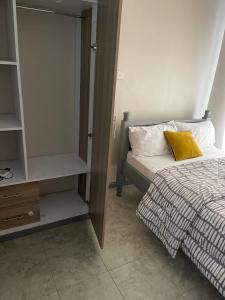Cama ou camas em um quarto em Lulu’s staycations Tsavo