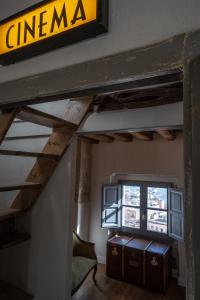 TV a/nebo společenská místnost v ubytování Palazzo Boyl 1840