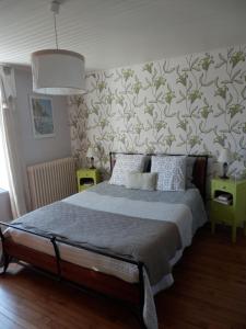 Posteľ alebo postele v izbe v ubytovaní Chambre d'hôte Jules & Annette
