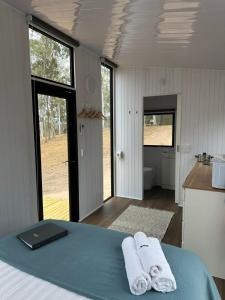 Imagen de la galería de The Retreat Tiny House 2, en Lagoon Pocket