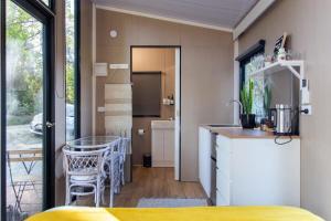 a kitchen with a counter and a table in a room at Forest Hill Farm in Herbert