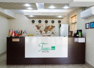 a guest room at a hotel with a check in counter at TOURIST INN hotel in Tashkent