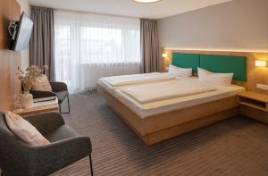 Ένα ή περισσότερα κρεβάτια σε δωμάτιο στο Hotel Seestern +5 φωτογραφίες