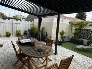 Posezení v ubytování Charmante maison au calme