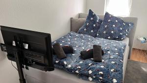En eller flere senger på et rom på Apartment 2 ideal für Familien und Geschäftsreisende ABG69