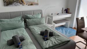 En eller flere senger på et rom på Apartment 2 ideal für Familien und Geschäftsreisende ABG69