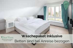 Postel nebo postele na pokoji v ubytování Haus Bill 15 Sturmschwalbe