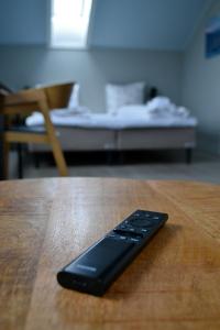 Postel nebo postele na pokoji v ubytování Andenes Suitehotel