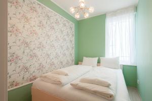 Postel nebo postele na pokoji v ubytování LIDO Apartmanok By BLTN Balatonlelle