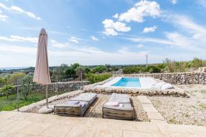 Kolam renang di atau di dekat Casa del Gelso - Trullo collinare con Vista Mare