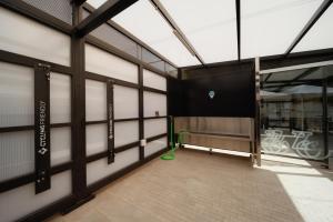 a room with a garage with graffiti on the wall at Don Gregory by Dunas - Adults Only in San Agustin