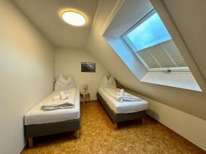 Posteľ alebo postele v izbe v ubytovaní Bauernchalet Alois