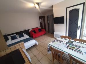 Posteľ alebo postele v izbe v ubytovaní Latre frères Location