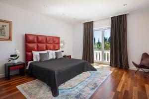 Postel nebo postele na pokoji v ubytování La Villa Dubrovnik + 37 fotografií