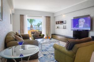 Телевизор и/или развлекательный центр в Monte Carlo Sharm Resort & Spa