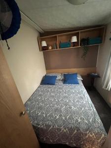 Łóżko lub łóżka w pokoju w obiekcie HOLIDAY PARK HOUSE