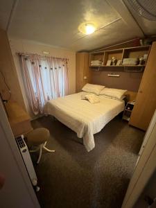 Katil atau katil-katil dalam bilik di HOLIDAY PARK HOUSE
