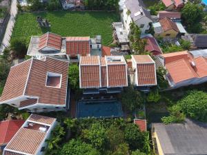an overhead view of a house with a pool at Truc Huy Villa in Hoi An