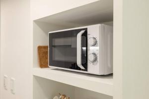 Kuchyň nebo kuchyňský kout v ubytování Warm Thing