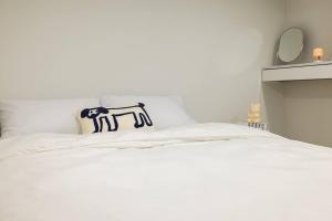 Postel nebo postele na pokoji v ubytování Warm Thing