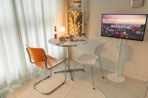 TV a/nebo společenská místnost v ubytování Warm Thing