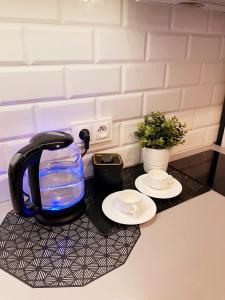 Παροχές για τσάι/καφέ στο HomeComfort Apartament DeLux