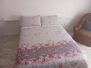 Un pat sau paturi într-o cameră la Casa Siempreviva