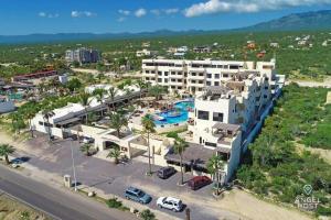 an aerial view of a resort with a pool at Oceanview Stay, Satellite Internet, Steps to Beach in El Sargento