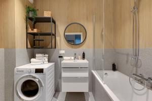 Kúpeľňa v ubytovaní Scala City Center Premium Apartments by Lion Apartments