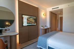 Кровать или кровати в номере Hotel Croatia