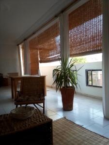 Istumisnurk majutusasutuses Maison Manour Chambre espacée et climatisée