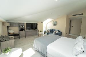 Кровать или кровати в номере Hotel Lux Melide