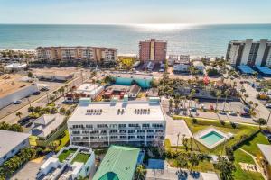 an aerial view of a city with the ocean at Madeira Del Mar Penthouse #2- Premier in St Pete Beach
