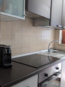 Virtuvė arba virtuvėlė apgyvendinimo įstaigoje Gemma del mare