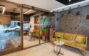 a living room with a couch and a table at Orya Hotel in Istanbul