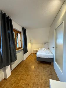Posteľ alebo postele v izbe v ubytovaní Bauernchalet Alois