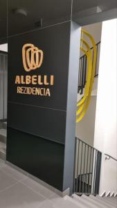 a sign for aldebilli reichenichenza in a building at M&M2 Brand new apartment near center with parking in Košice