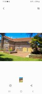 a picture of a building with a tennis court at Nyahururu Highlands Heaven -BnB in Nyahururu