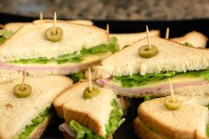 a group of sandwiches with tooth picks in them at Colonial Flat Hotel in Itapetininga