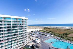 an aerial view of a hotel and the beach at Caribe Resort Unit C1108 in Orange Beach