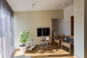 TV a/nebo společenská místnost v ubytování 714 Mugnano House Aveleda + 31 fotografií